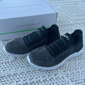 Brand New APL Women’s Techloom Breeze Black/Smoke/Ombre Shoes